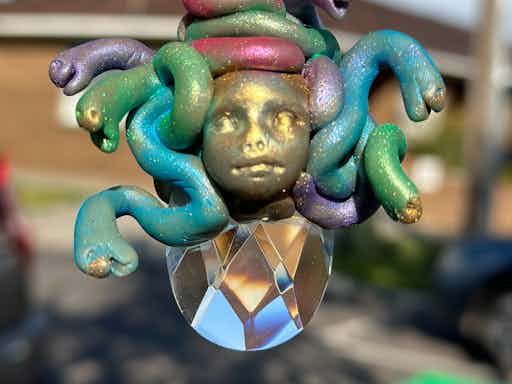 Dragons and Medusa sculpture
