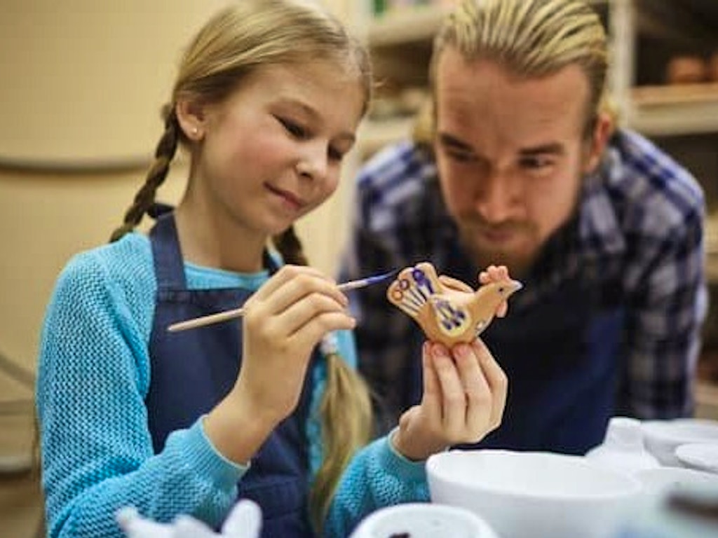 photo-of-child-s-hand-playing-clay-2425817